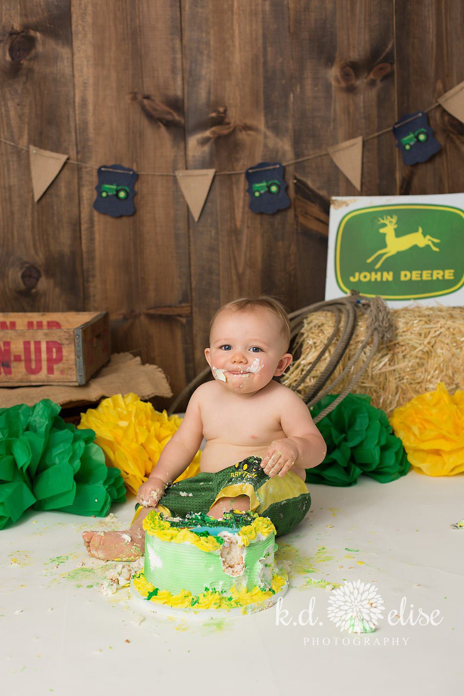 John Deere themed cake smash photo session.