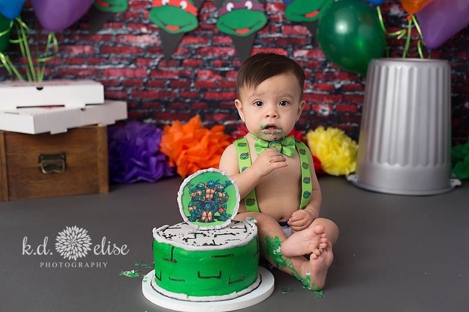 Ninja Turtle themed cake smash by Pueblo photographer K.D. Elise Photography.