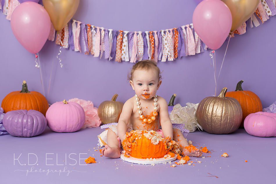 Pueblo photographer K.D. Elise Photography's pumpkin themed first birthday cake smash session.