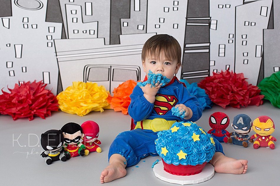 Superhero themed cake smash session by Pueblo photographer K.D. Elise Photography.