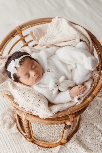 Newborn investment button.